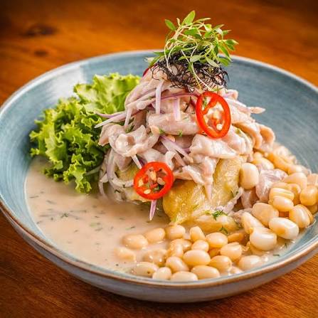 A vivid Peruvian ceviche with cancha, red onion and chilli