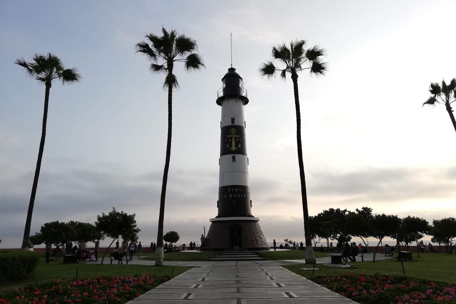 The Miraflores lighthouse framed by palms