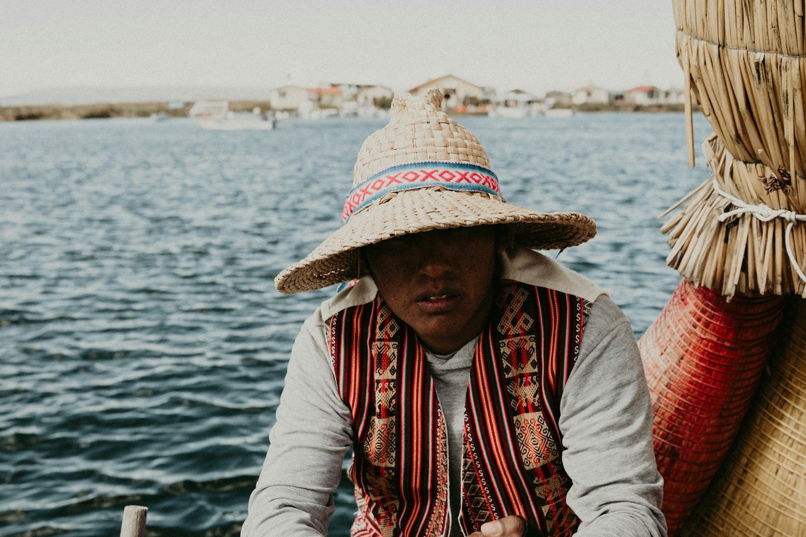 An islander in traditional dress on Lake Titicaca